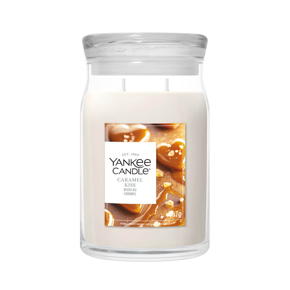 Yankee Candle Caramel Kiss, jar candle with a label on a white background
