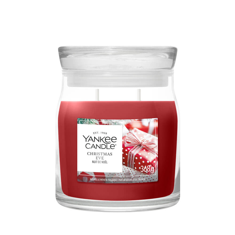 Yankee Candle Christmas Eve candle in a glass jar on a white background
